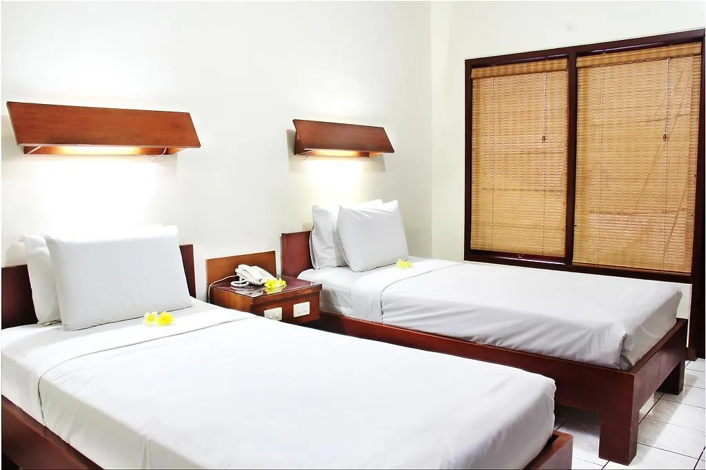 Отель Paradiso Beach Inn Кута